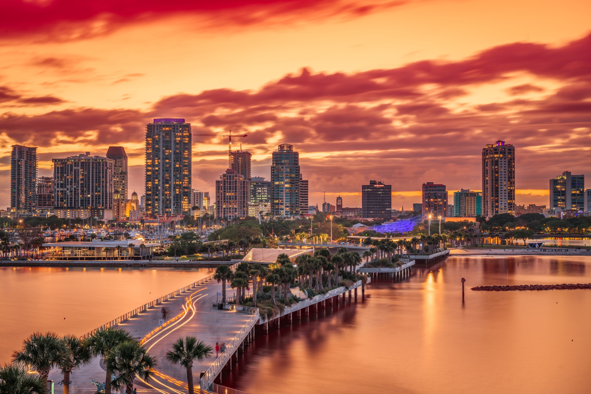 The St. Pete Pier and downtown skyline glowing at dusk over the waterfront