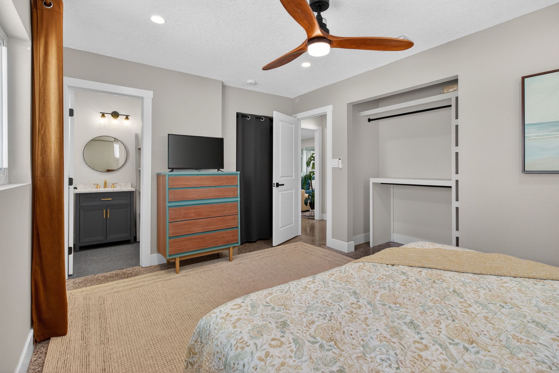 Primary bedroom with en-suite bath and calm neutral palette