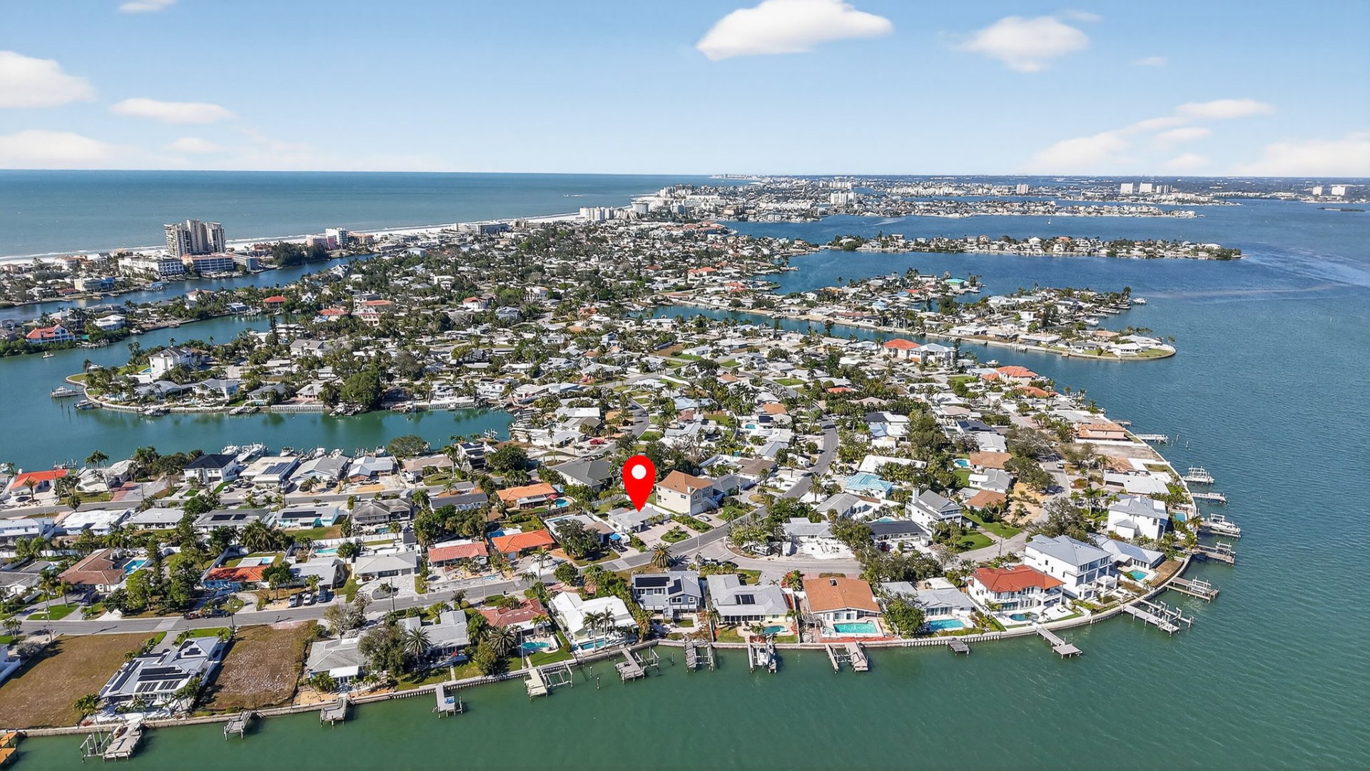 Aerial view looking northwest over St. Pete Beach with the Gulf and Intercoastal Waterway framing the neighborhood
